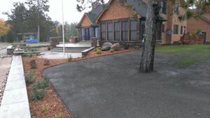 Landscaping with shredded mulch by Twin Oaks Landscaping