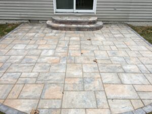 Brick paver patio and steps by Twin Oaks Landscaping