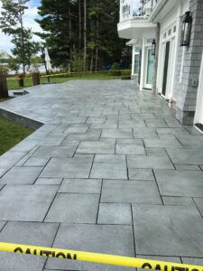 Brick paver outdoor living space by Twin Oaks Landscaping