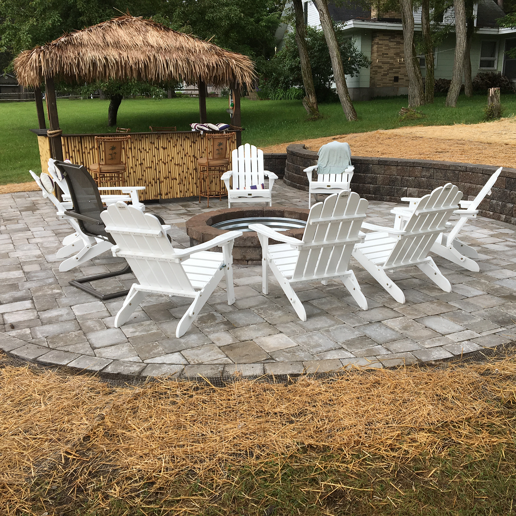 Outdoor living paver patio and fireplace