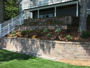 Retaining wall and softscape design by Twin Oaks Landscaping